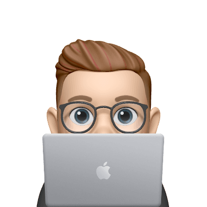 Man looking from behind the laptop